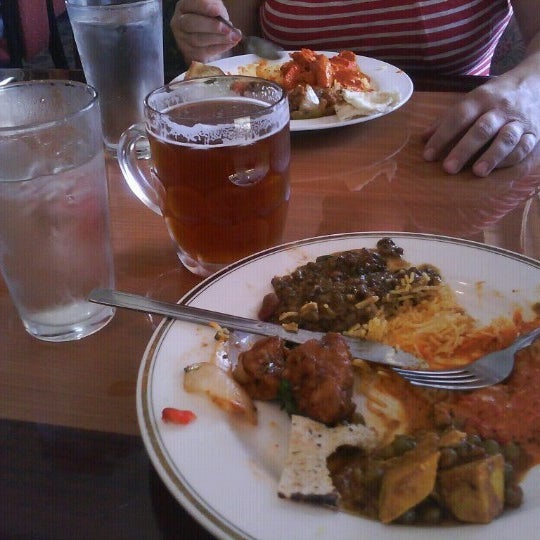 Photo taken at Spice Trade Brewing Company Restaurant by Jose C. on 9/2/2012