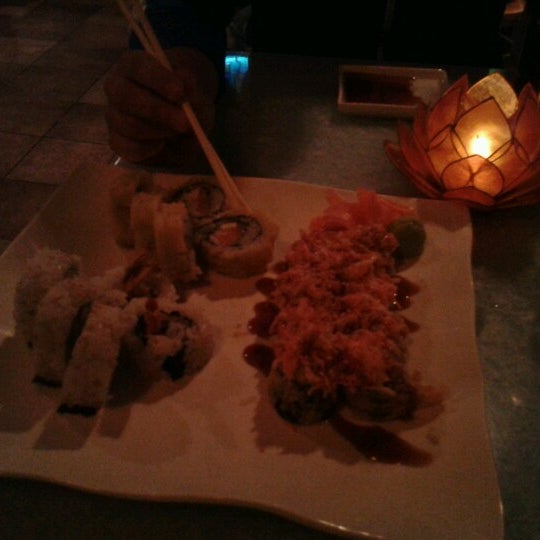 Photo taken at Koko Sushi Bar &amp; Lounge by Brandon D. on 8/22/2012