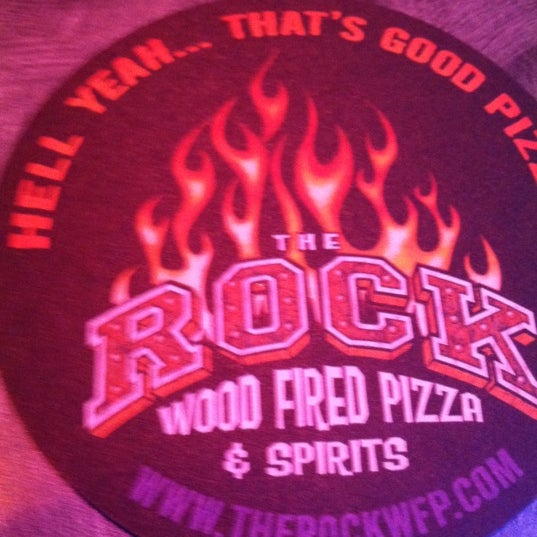 Photo taken at The Rock Wood Fired Pizza by Kiki on 9/6/2012