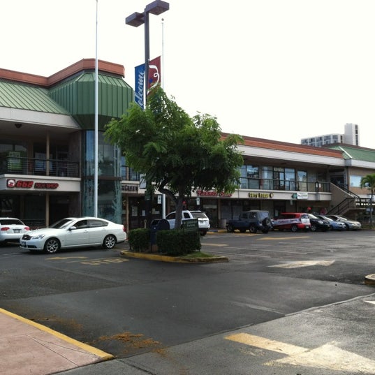 Photo taken at McCully Shopping Center by Ani T. on 8/9/2012