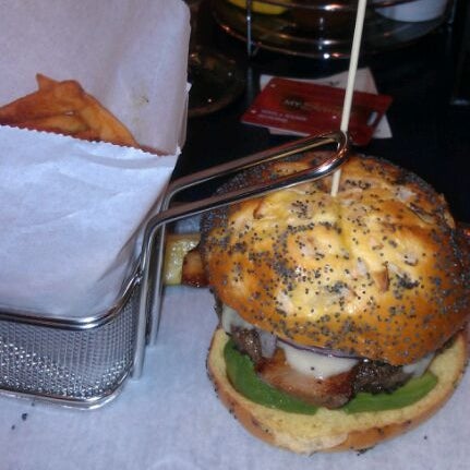 Photo taken at Burgers and More by Emeril by Kevin W. on 3/22/2012