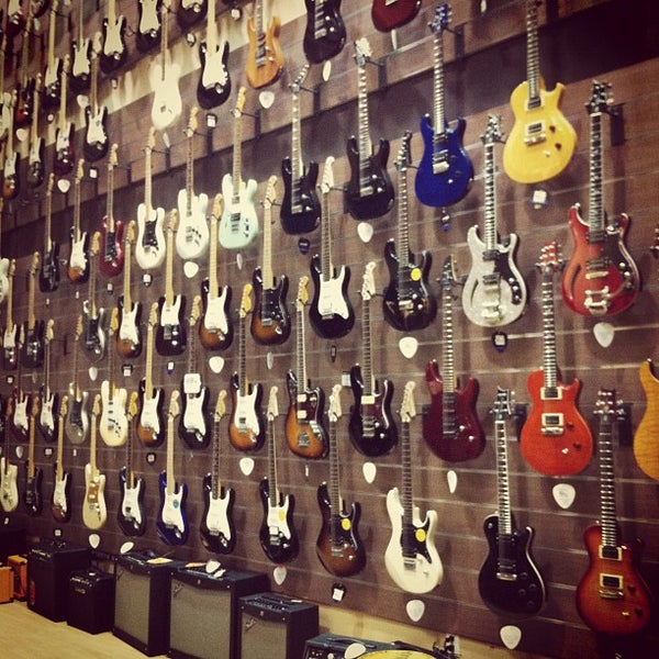 Photo taken at Cosmo Music - The Musical Instrument Superstore! by Nate K. on 4/22/2012
