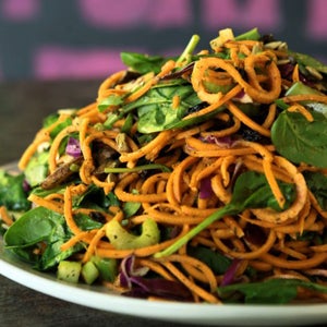 Try the sweet potato pasta — narrow strips of sweet potato atop red cabbage, spinach, mushrooms, celery, sunflower seeds, green onions and currants, with a spicy herb-vinaigrette kick. (Joe Bonwich)