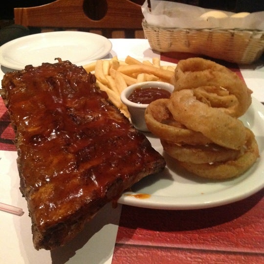 Photo taken at Jack&#39;s Bullpen Steakhouse by André V. on 8/4/2012