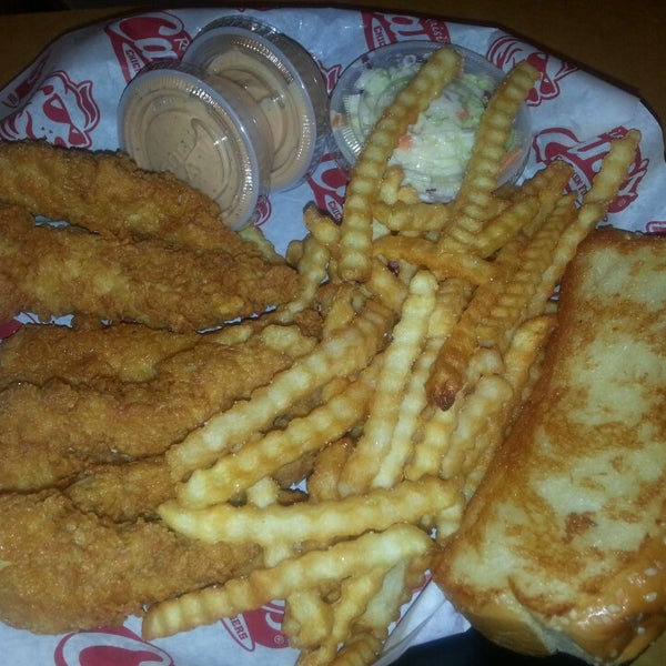 Photo taken at Raising Cane&#39;s Chicken Fingers by Michael on 2/24/2014