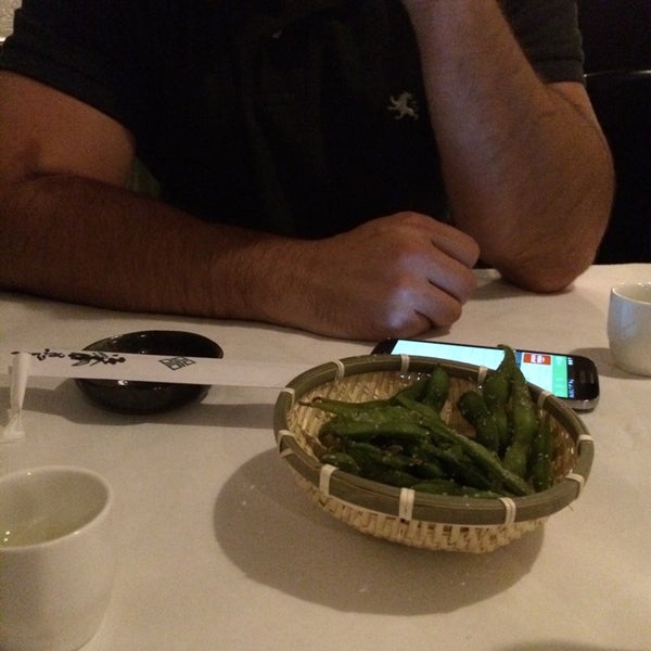 Photo taken at Umami Restaurant and Sushi Bar by Mariela on 5/17/2014
