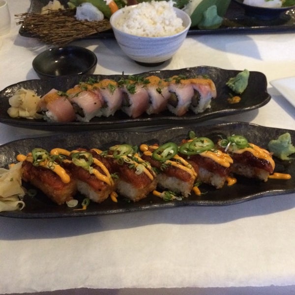 Photo taken at Umami Restaurant and Sushi Bar by Mariela on 7/23/2014