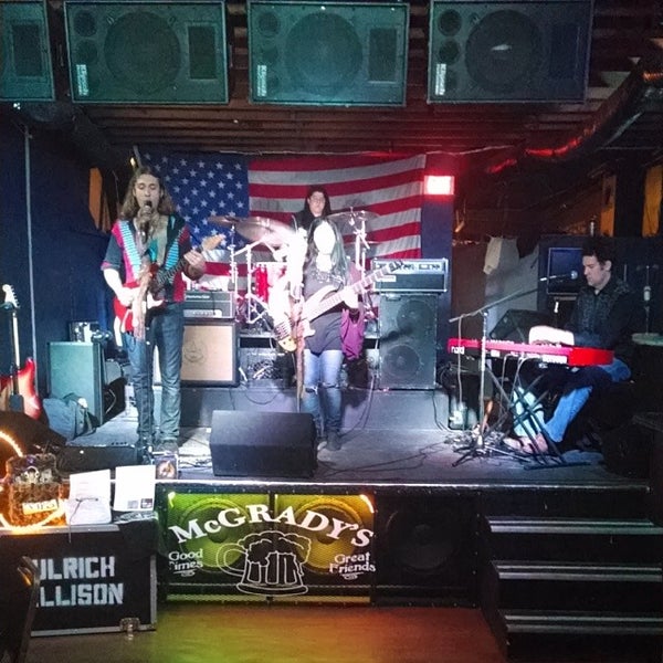 Photo taken at McGrady&#39;s Bar by Jeff M. on 2/23/2014