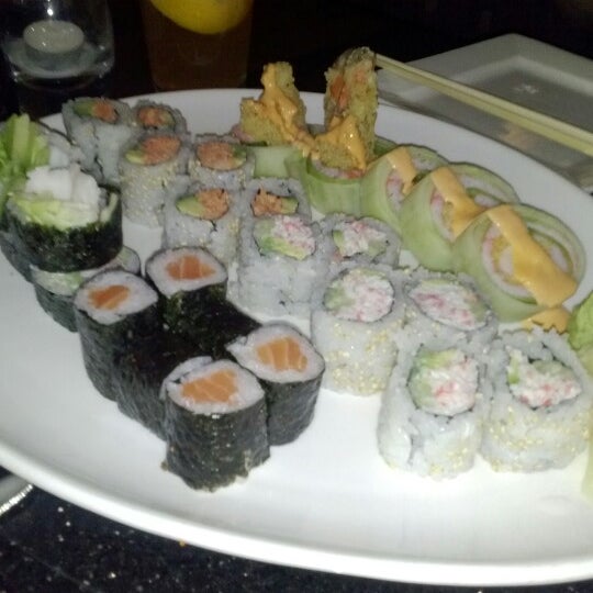 Photo taken at East Moon Asian Bistro &amp; Sushi by MUNSON !. on 2/12/2013