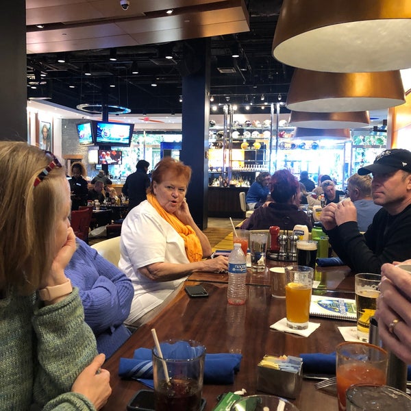 Photo taken at National Pastime Sports Bar &amp; Grill by Amanda M. on 12/8/2019