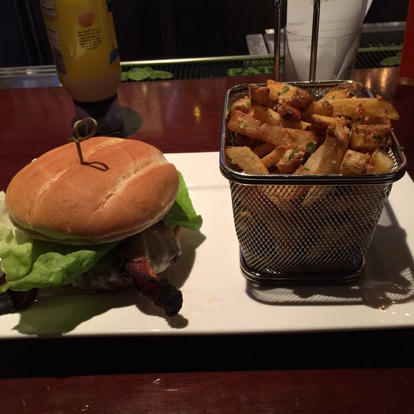Photo taken at Broadway Burger Bar &amp; Grill by Jerman A. on 12/8/2015
