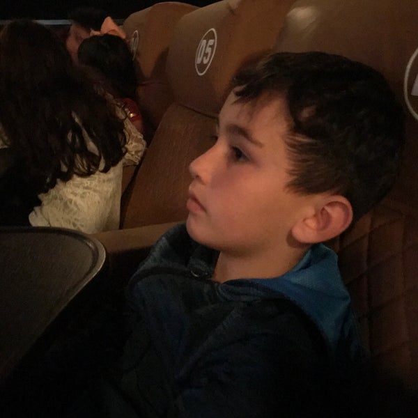 Photo taken at Studio Movie Grill City Centre by Jonathan S. on 3/31/2019