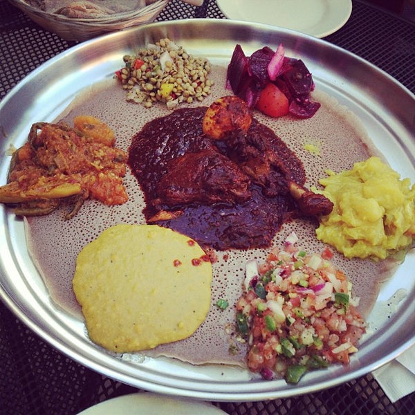 Photo taken at Ras Dashen Ethiopian Restaurant by Ngoc N. on 5/21/2013