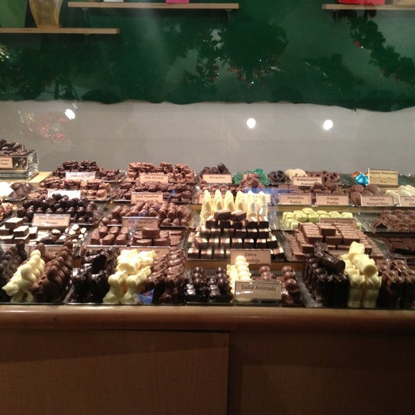 Photo taken at teuscher Chocolates - Rockefeller Center by James P. on 12/21/2012
