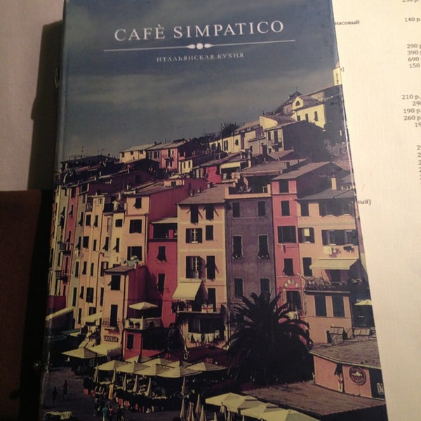 Photo taken at Cafe Simpatico by Yulia G. on 7/27/2013
