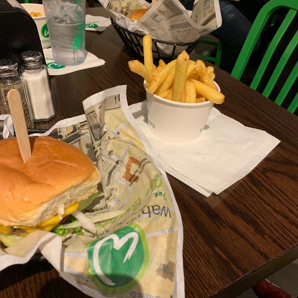 Photo taken at Wahlburgers by Lauren H. on 12/31/2018