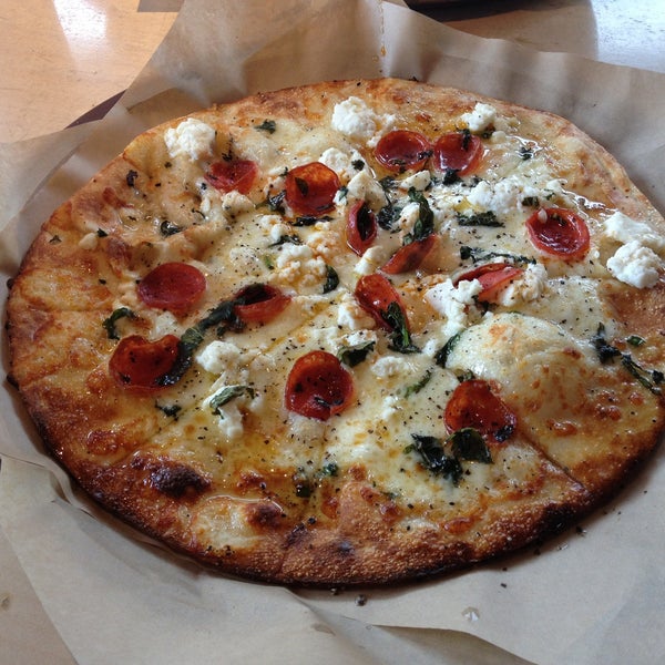 Photo taken at Pieology Pizzeria by Connie M. on 5/7/2013