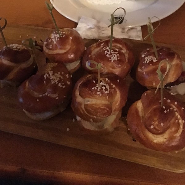 You wanna get the Little Bavarians... Mini pretzel slider rolls with brat, cheese, and bacon.