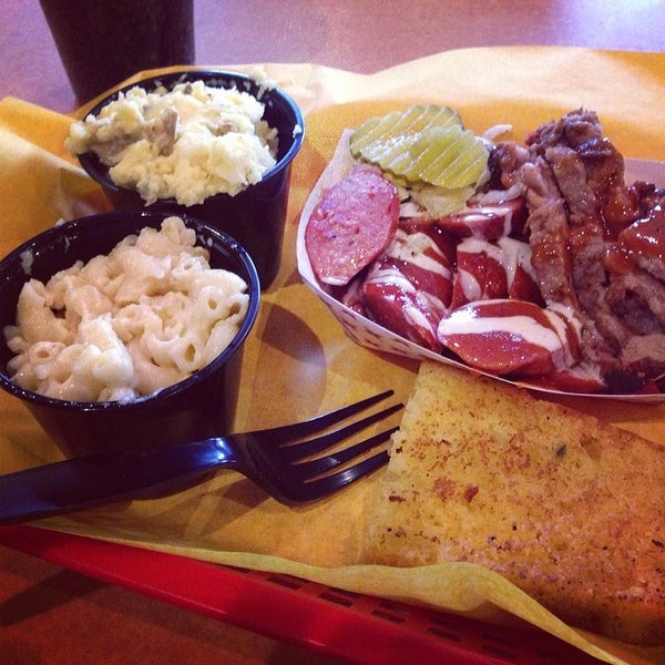 Photo taken at Moe&#39;s Original BBQ by Eric M. on 2/25/2014