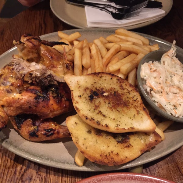 Photo taken at Nando&#39;s by Tugce on 12/23/2015