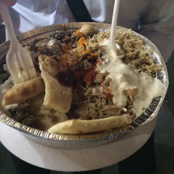 Photo taken at The Halal Guys by Julie S. on 8/12/2015