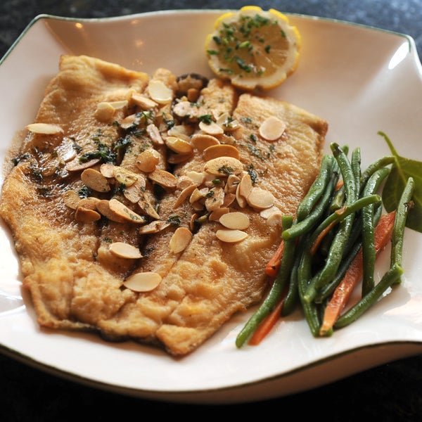 From our review: The "buttery, beautifully browned version" of trout amandine "might make you a little giddy." Meat-eaters should try the steak au poivre. Read more: http://bsun.md/14vWku5