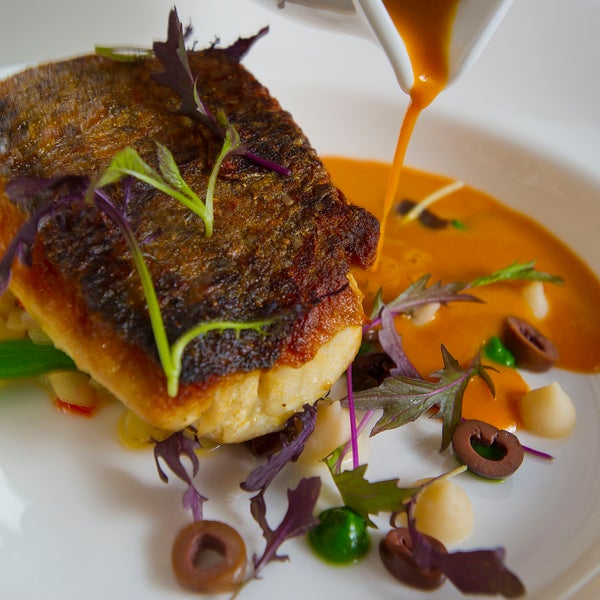 In our review: Try the chicken liver parfait or marinated fluke to start. As an entree, braised beef ribs are "not-to-be-missed." Read more: http://bsun.md/TWvlx4