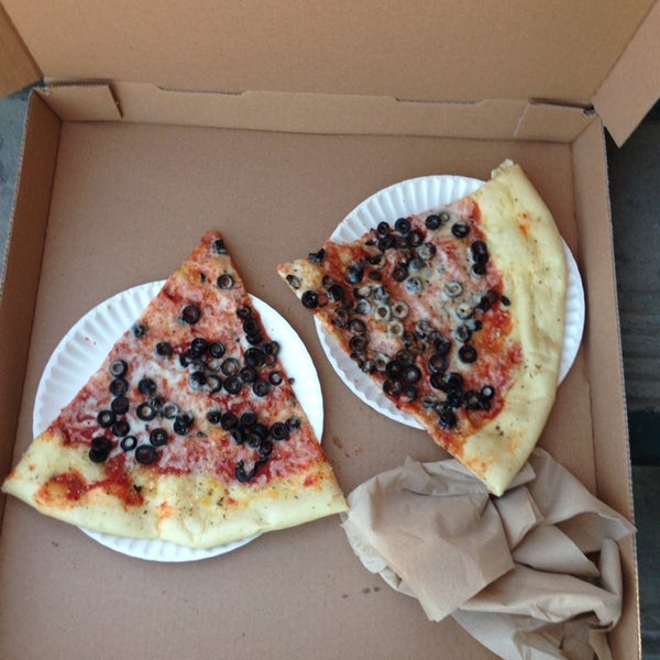 That's two slices in a large box (and some crumpled up napkins).