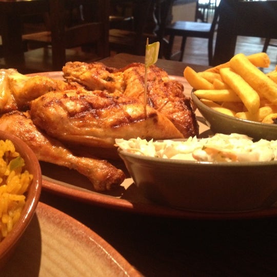Photo taken at Nando&#39;s by Deltastreet on 4/10/2013