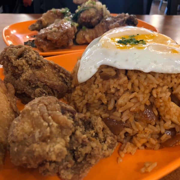 Go for Nasi Goreng set meal. It has pieces of fried chicken and a big cup of Nasi Goreng topped with sunny side up egg!