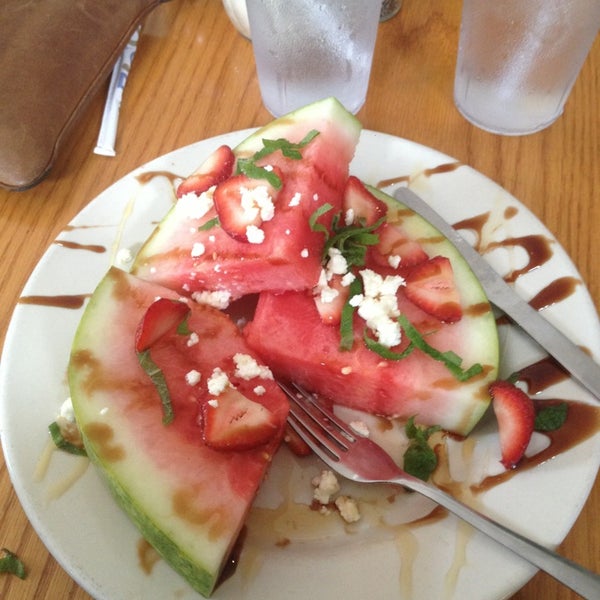 Discovered the perfect summer salad here: a wheel if watermelon topped with crumbled feta, sliced strawberries, shredded mint and drizzles of blood orange and Piet reduction. Delightful!