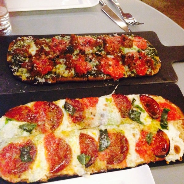 Photo taken at Pizza Vinoteca by Sara N. on 4/4/2014