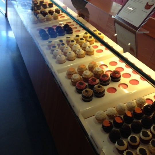 Photo taken at Kara&#39;s Cupcakes by Alex P. on 11/11/2012