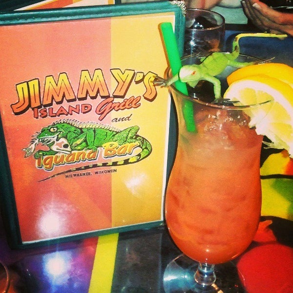 Photo taken at Jimmy&#39;s Island Grill &amp; Iguana Bar by Bryan C. on 3/24/2013