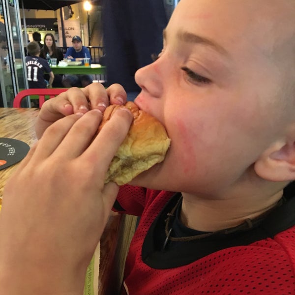 Photo taken at BurgerFi by Shannon G. on 3/6/2016