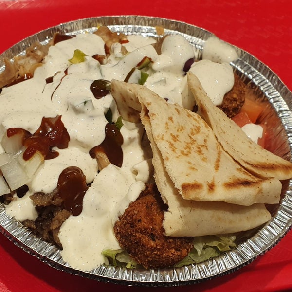 This place is way overrated. Had chicken/gyro combo platter - the taste is only OK. The falafel are the smallest I've ever had (the small brown discs) and are a bit dry. The hot sauce is super hot