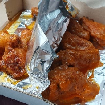 The wings were huge & crispy.  Buffalo (medium) was good. Asian Apricot was good too, with a string ginger taste. You can choose a different sauce for every 5 wings, which is nice.