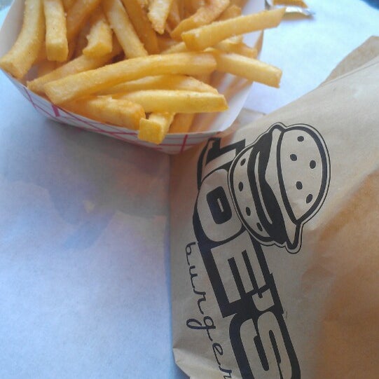 Photo taken at Joe&#39;s Burgers by jamie s. on 5/21/2013