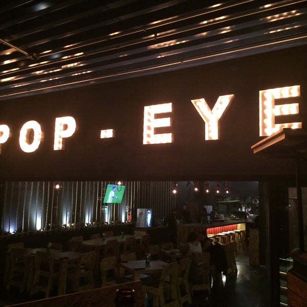 Photo taken at POP • EYE Shrimp &amp; Burger by Horacio M. on 8/15/2015