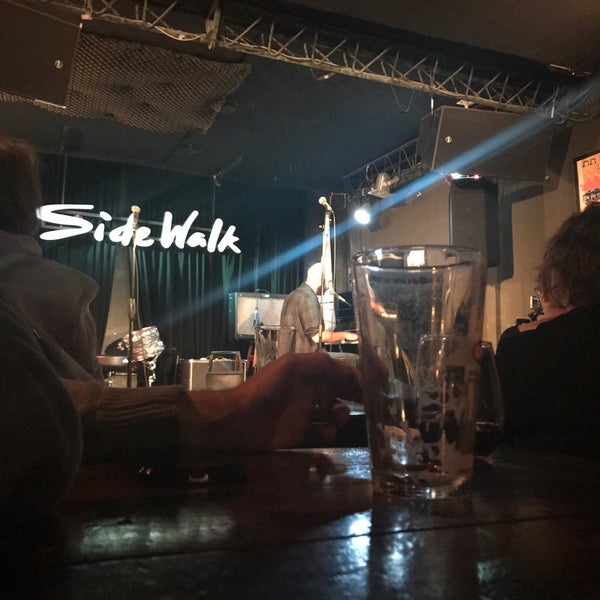 Photo taken at Sidewalk Bar &amp; Restaurant by Samuel B. on 9/29/2017