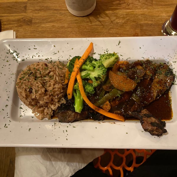 Photo taken at Jasmine&#39;s Caribbean Cuisine by Ricardo R. on 12/16/2021