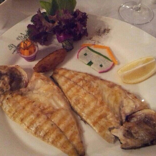 Photo taken at Rodos Balık Restaurant by Ahmet Ö. on 4/8/2014