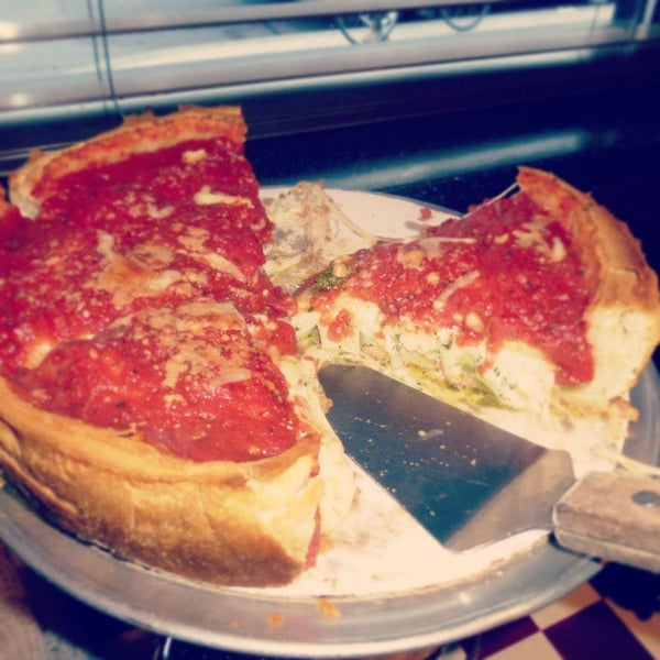 Photo taken at Giordano&#39;s by Jackie O. on 3/23/2013