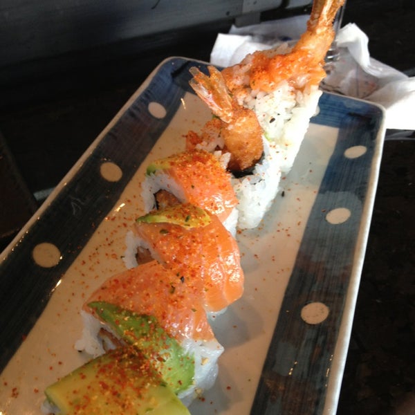 Photo taken at Blue Wasabi Sushi &amp; Martini Bar by Erin on 8/21/2013