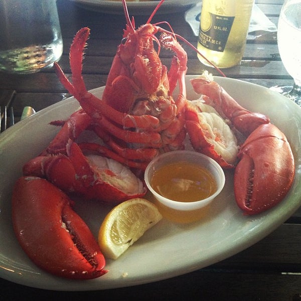 Photo taken at The Whale&#39;s Tale Oyster Bar, Chowder House &amp; Seafood Grill by Cory C. on 7/4/2013
