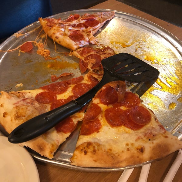 The large double pep pizza was under baked. The crust is thin but the amount of grease from the generous portion of cheese soaked through and made for a slimy mess. The cheese slid off the crust. Ugh.