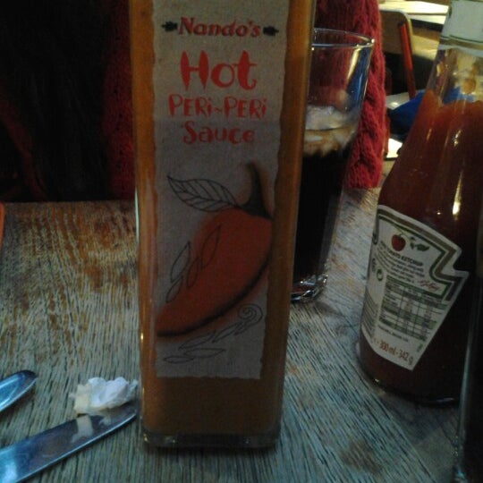 Photo taken at Nando&#39;s by Mauro F. on 1/19/2013