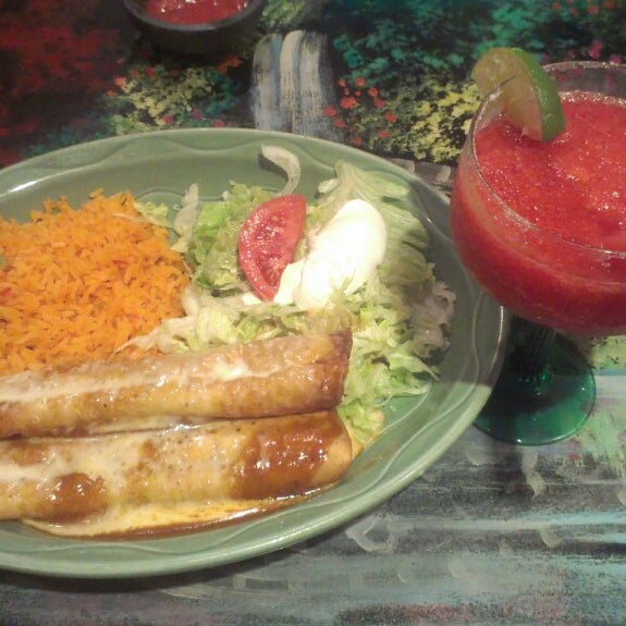 Photo taken at Los Agaves Mexican Grill by Ashley H. on 1/20/2014