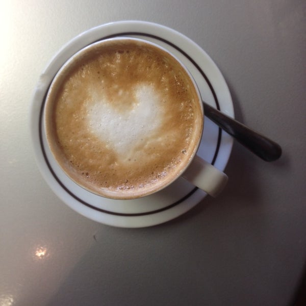 Photo taken at Harrar Coffee &amp; Roastery by Lindsay H. on 4/22/2014