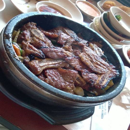 Photo taken at Dolsot House | K-Town BBQ Korean Restaurant by Ashley. on 6/26/2014
